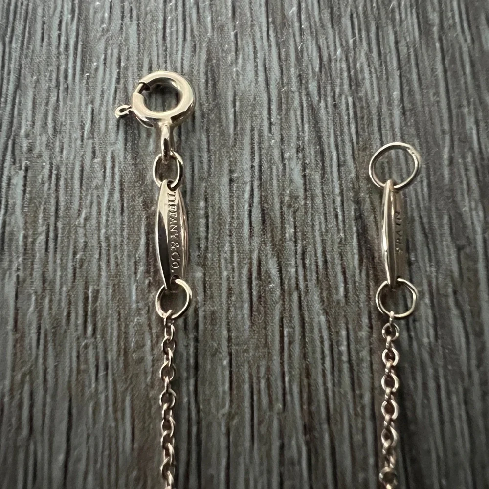 Tiffany & Co. Gold Heart Necklace with Silver Accents - Picture 5 of 10
